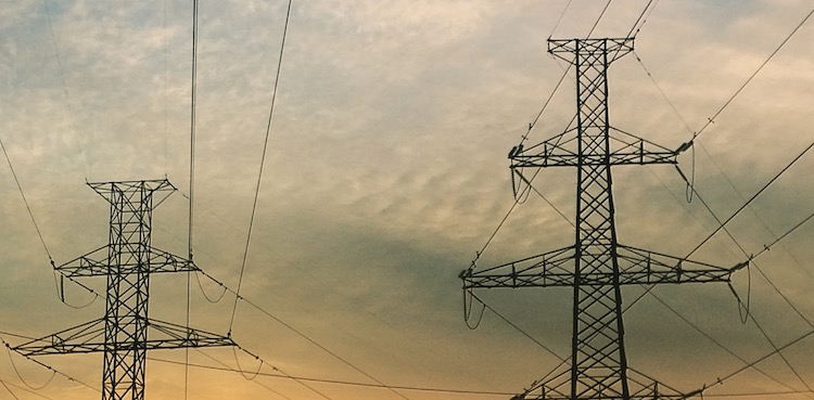 electrical power pylons at sunset